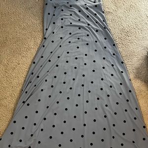Xs skirt but is long enough to be worn as a dress in most cases